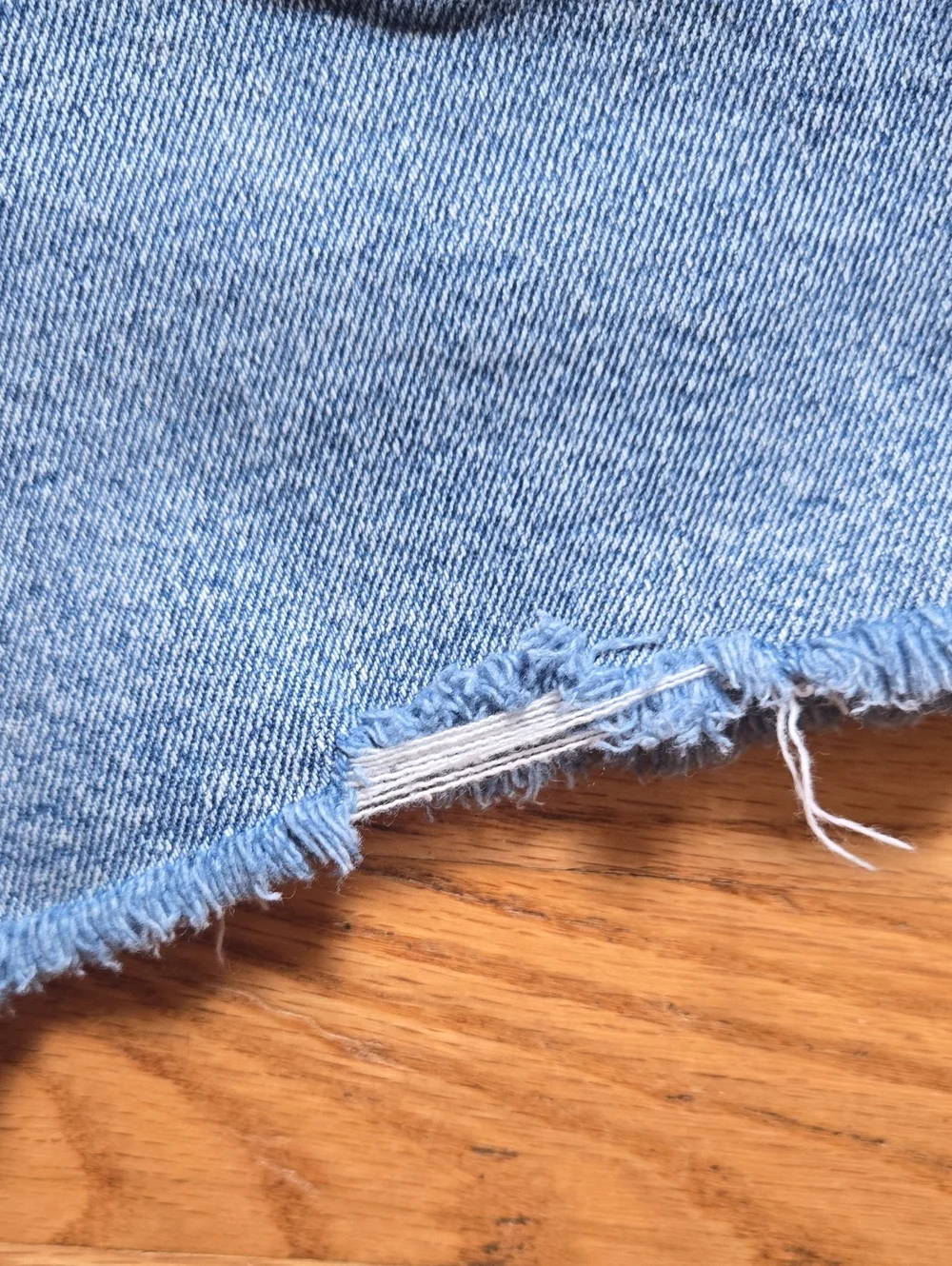 Faherty Indigo Dyed light distress high rise denim cutoff shorts